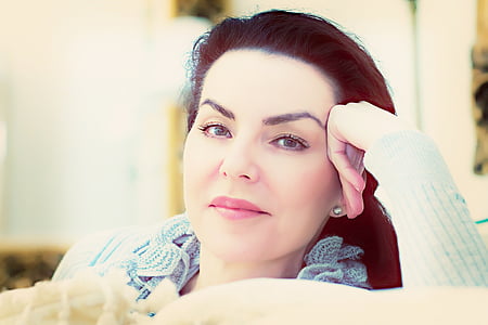 woman wearing blue long-sleeved shirt thumbnail