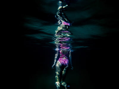underwater photo of woman wearing pink monokini thumbnail
