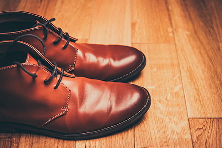 pair of brown leather chukka boots thumbnail