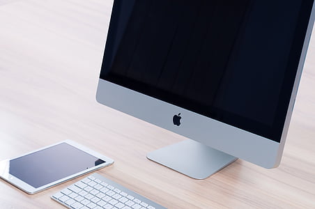silver iMac on table thumbnail