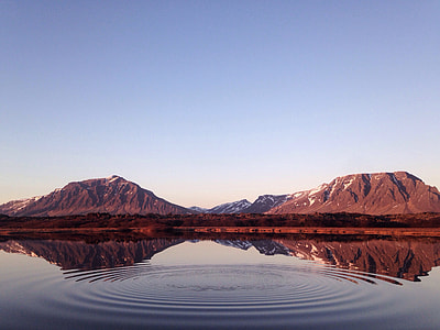 mountain view near body of water thumbnail