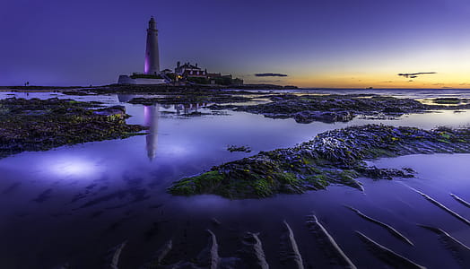 Lighthouse Under Clear Blue Sky thumbnail