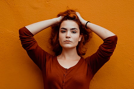 woman wearing maroon button-down sweatshirt thumbnail