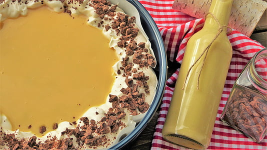 baked caked near yellow glass bottle thumbnail