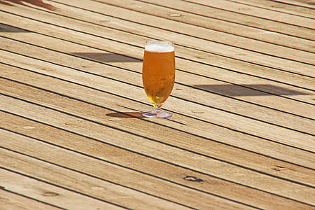 Clear Short-stem Wine Glass on Parquet Flooring thumbnail