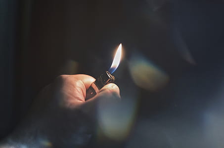 Person Holding Lighter thumbnail