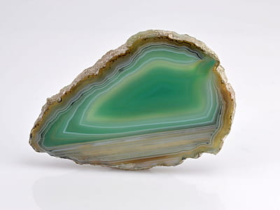 close-up photo of green and brown geode thumbnail