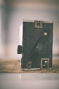 black leather radio placed on beige mat thumbnail