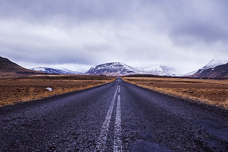 asphalt road through mountain thumbnail