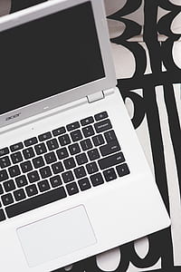 Top view of white Acer laptop with black keyboard thumbnail