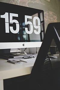 white iMac on table thumbnail