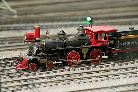 selective focus photography of black train model thumbnail
