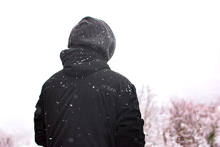 person wearing hooded jacket during winter thumbnail