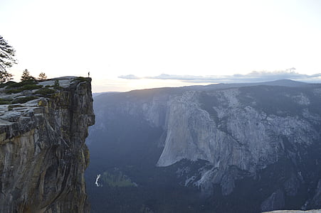 person standing on cliff thumbnail