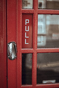 red closed door with pull sign thumbnail