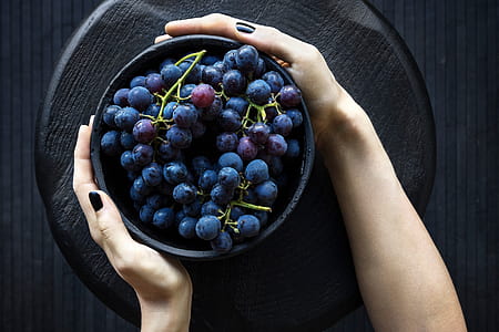 purple grapes in black bowl thumbnail