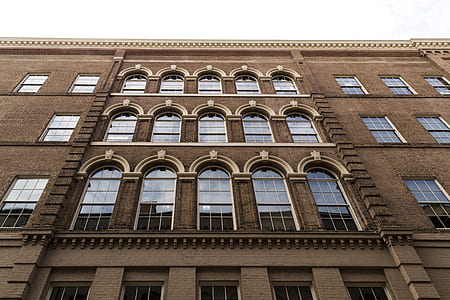 low-angle view of brown building thumbnail