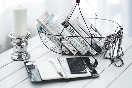 Black smartphone and headphones with various items thumbnail