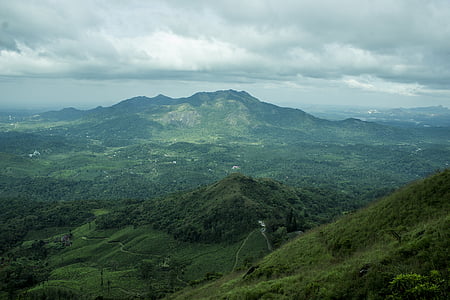 aerial view of mountains during cloudy sky thumbnail