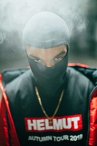 man wearing black balaclava thumbnail