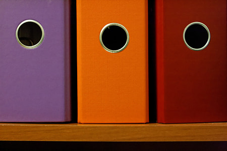 purple, orange, and red file organizers thumbnail