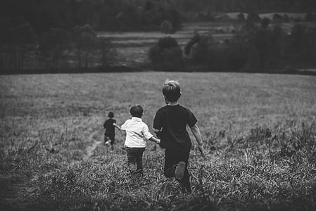 three running children in field thumbnail