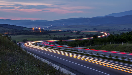 time lapse photography of whining road thumbnail