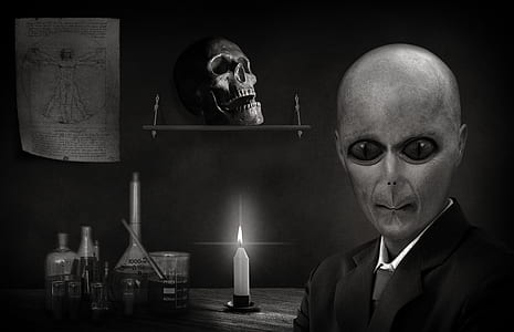 an alien in black suit jacket thumbnail