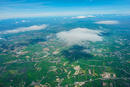 white clouds on land thumbnail