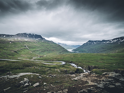time lapse of green grass and mountain photo thumbnail