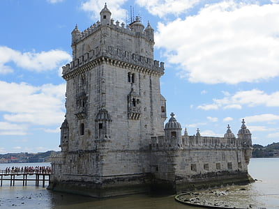 gray concrete castle near ocean thumbnail