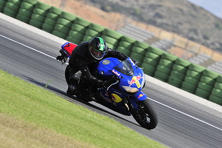man riding on sports bike thumbnail