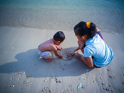 boy and girl on seashore thumbnail