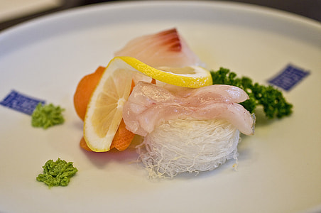 fish with lemon on plate thumbnail