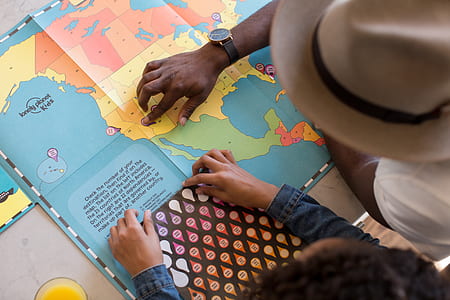man pointing on map on the table thumbnail