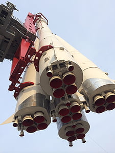 low angle photo of white and red rocket thumbnail