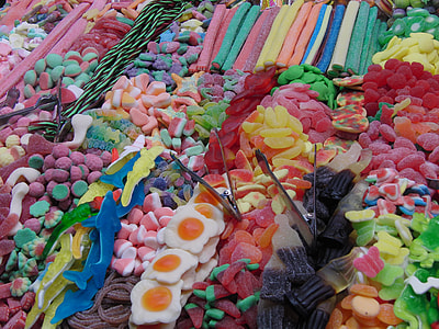 assorted gummy candies on rack thumbnail