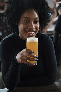 Woman Holding Beer Mug thumbnail
