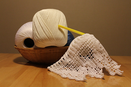 two white and gray yarns on basket thumbnail