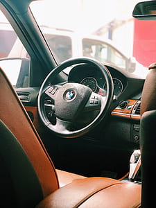 black BMW car steering wheel thumbnail