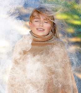 woman wearing brown cape thumbnail