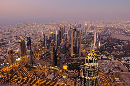 aerial view of city during sunset thumbnail