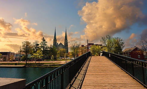 footbridge over river near church thumbnail