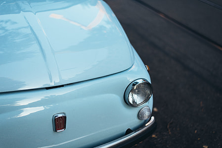 closeup photo of teal FIAT vehicle thumbnail