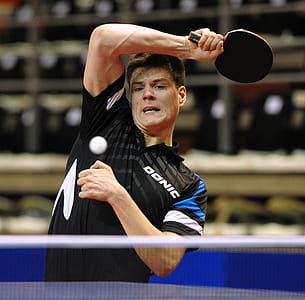 selective focus photography of man playing table tennis thumbnail
