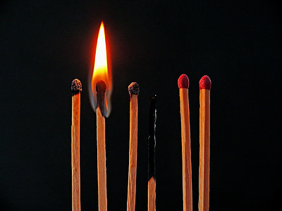 four black and two red matchsticks thumbnail