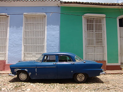 vintage blue car parked on roadside during daytime thumbnail