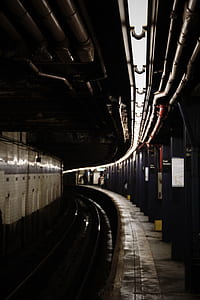 people standing beside train railway thumbnail