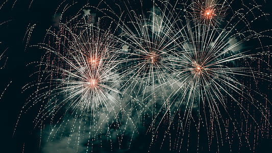 orange fireworks during night time thumbnail