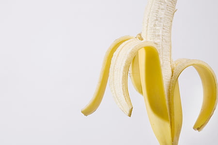 peeled banana with white background thumbnail